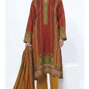 A model wearing a red printed 3-piece lawn suit by Khaadi. The outfit features a long kurta with intricate vertical patterns and detailed borders in green and gold tones, paired with mustard dyed trousers and a matching printed dupatta with striped and floral designs. The model stands against a plain background, holding the dupatta, with product fabric details displayed on the left side.
