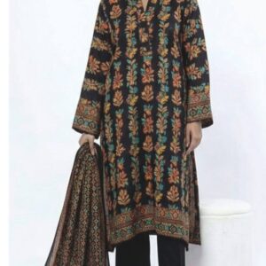 A model wearing a SS2356A 3-piece lawn suit by Khaadi. The outfit features a long kurta with intricate vertical patterns and detailed borders, paired with dyed trousers and a matching printed dupatta with striped and floral designs. The model stands against a plain background, holding the dupatta, with product fabric details displayed on the left side.