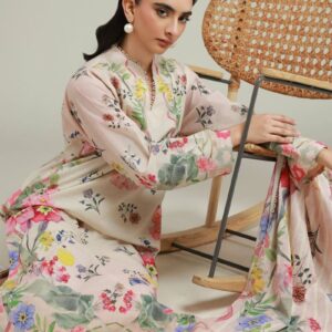 A model wearing a T-A22-26-103FA1 3-piece lawn suit by Khaadi. The outfit features a long kurta with intricate vertical patterns and detailed borders, paired with dyed trousers and a matching printed dupatta with striped and floral designs. The model stands against a plain background, holding the dupatta, with product fabric details displayed on the left side.