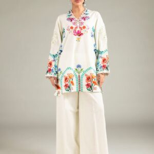 White floral embroidered Pakistani lawn kurti for women with colorful floral print, full sleeves, and wide-leg trousers – elegant summer outfit.